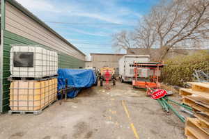 View of patio / terrace featuring an outbuilding