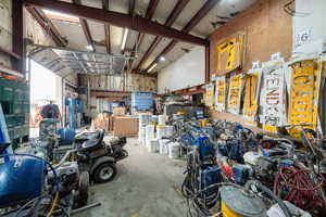 Garage featuring a workshop area