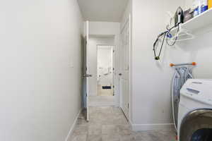 Laundry area featuring washer / clothes dryer