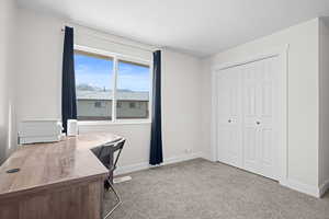Home office featuring a textured ceiling