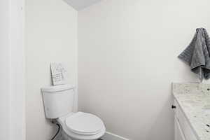 Half/Bath featuring the toilet