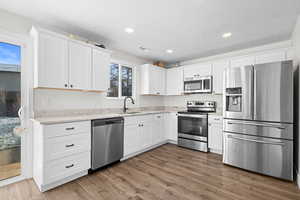 Kitchen with recessed lighting  and a LVP floors