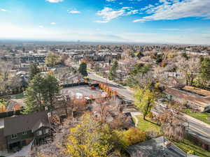 Aerial perspective of suburban area featuring a mountain backdrop