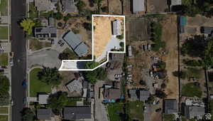 Aerial perspective of suburban area with property boundaries highlighted