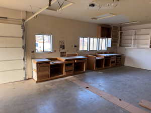 Garage featuring electric panel