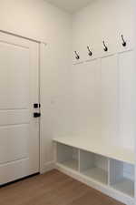 Mudroom with wood finished floors