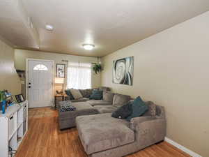 Living area featuring light wood-type flooring