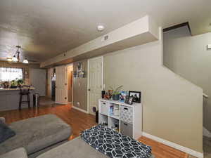 Living room featuring light wood-style flooring