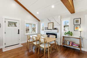 Dining space with recessed lighting and hardwood / wood-style flooring