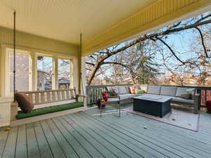 Wooden deck with an outdoor hangout area