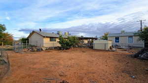 View of yard featuring a gate