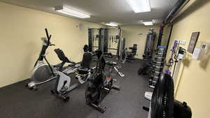 Workout area with a textured ceiling
