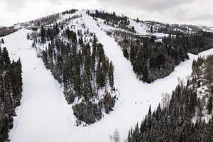 Snowy aerial view with a mountain view