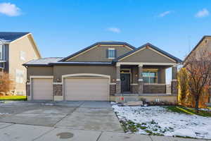View of front of home featuring stucco siding, a porch, concrete driveway, and a garage
