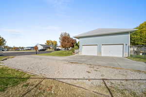 Garage with a residential view and driveway