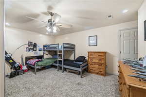 Bedroom featuring recessed lighting, light carpet, and ceiling fan