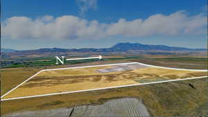 View of rural area featuring property boundaries highlighted and a mountainous background