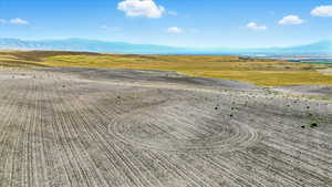 Aerial view of sparsely populated area with a mountainous background