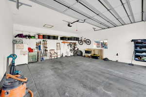 Garage with freestanding refrigerator