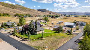 Aerial view of sparsely populated area featuring a mountain backdrop