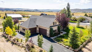 Aerial view of sparsely populated area with a mountain backdrop