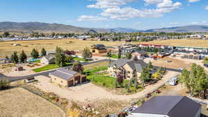 Aerial view of residential area featuring mountains
