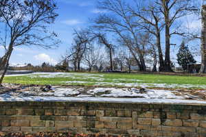 View of yard covered in snow