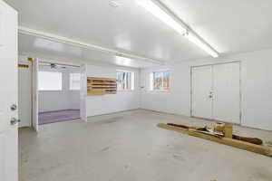 Garage featuring ceiling fan