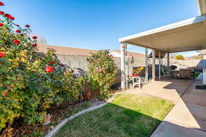 Fenced backyard featuring a patio area