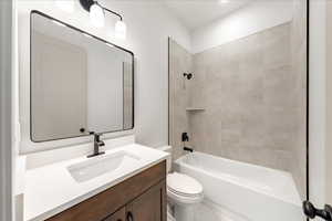 Bathroom with bathtub / shower combination and vanity