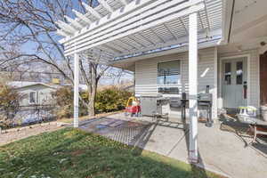 View of patio / terrace featuring a pergola and area for grilling