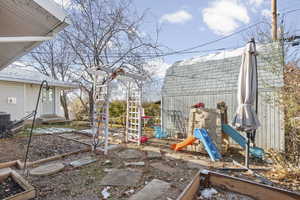 View of yard featuring a garden