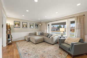Front room w/real hardwood floors, recessed lighting, wainscoting and view of Mt. Timpanogos.