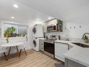 Downstairs second kitchen and laundry.