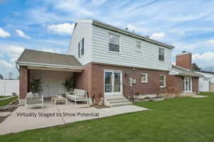 Backyard patio virtually staged to show potential.