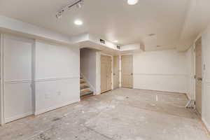 Below grade area featuring stairs