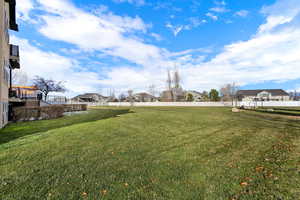 View of yard with a residential view