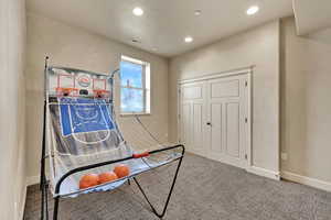 Playroom with baseboards and recessed lighting