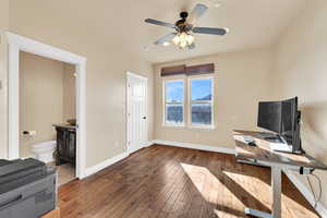 Unfurnished office with wood-type flooring and ceiling fan
