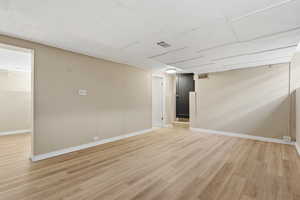 Mother-in-Law Livingroom featuring light wood finished floors and baseboards