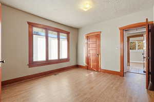 Master Bedroom and light wood-style flooring