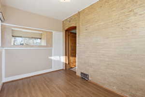 2nd Bedroom featuring wood finished floors