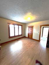 Bedroom #1 with large 3 panel window for amazing lighting.