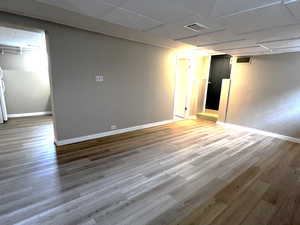 Very open 2nd living room with fresh paint and new flooring.