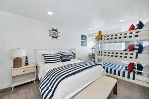 Carpeted bedroom featuring recessed lighting