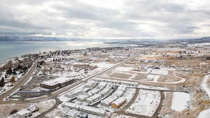 View of snowy aerial view and water view