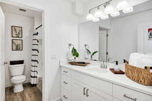 Full bathroom featuring vanity, shower / bath combination