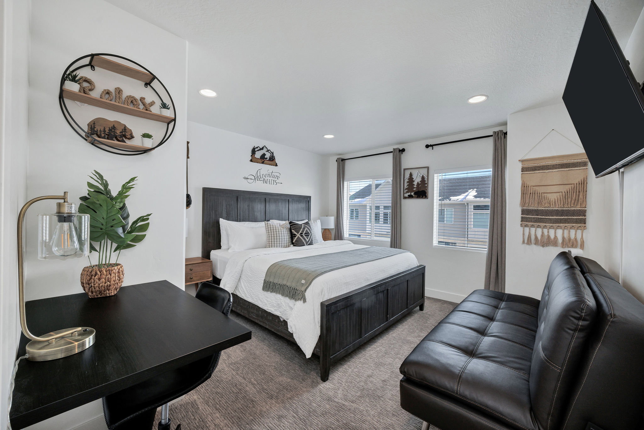 Carpeted bedroom with recessed lighting