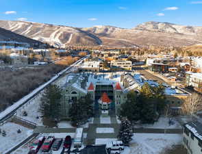 Snowy aerial view with a mountain view