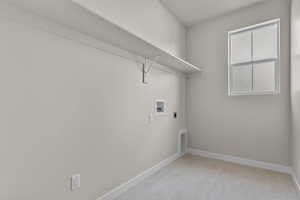 Washroom with hookup for an electric dryer and washer hookup